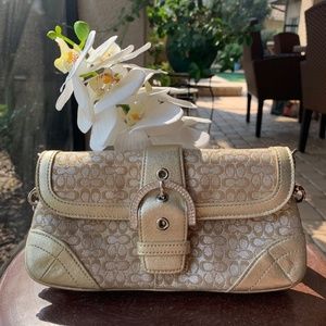 Gold shimmer Coach wristlet